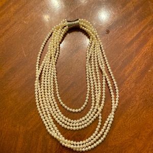 Pearl multi strand necklace with magnetic closure. Excellent condition.